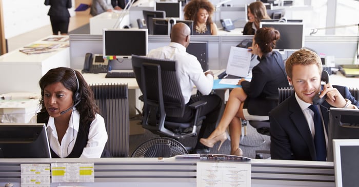 Colleagues at desk